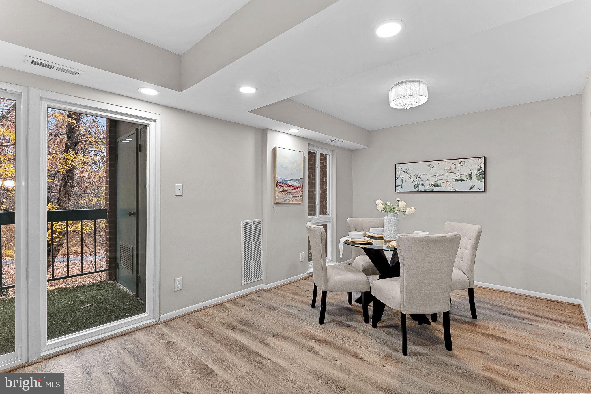 11808 Breton Court, Unit 12C Reston, VA 20191 - Photo 13 of 28 Formal Dining Room