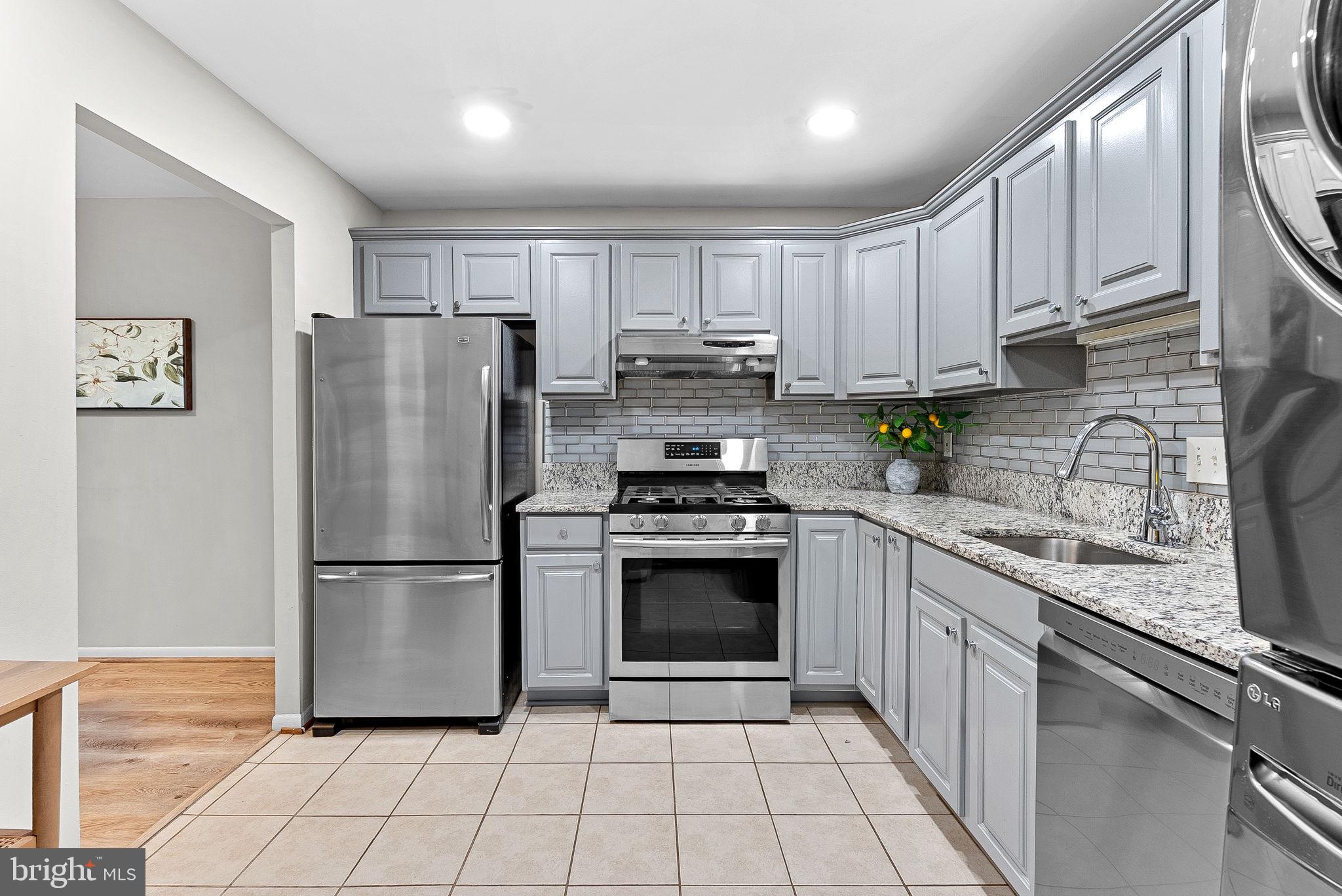 11808 Breton Court, Unit 12C Reston, VA 20191 - Photo 15 of 28 Gourmet Kitchen w/SS appliances and laundry