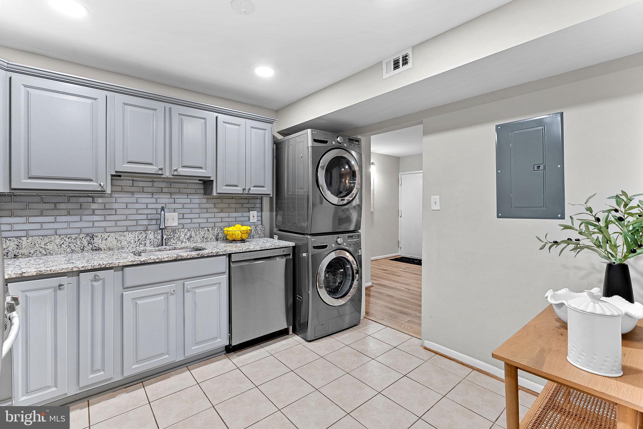 11808 Breton Court, Unit 12C Reston, VA 20191 - Photo 17 of 28 Gourmet Kitchen w/SS appliances and laundry