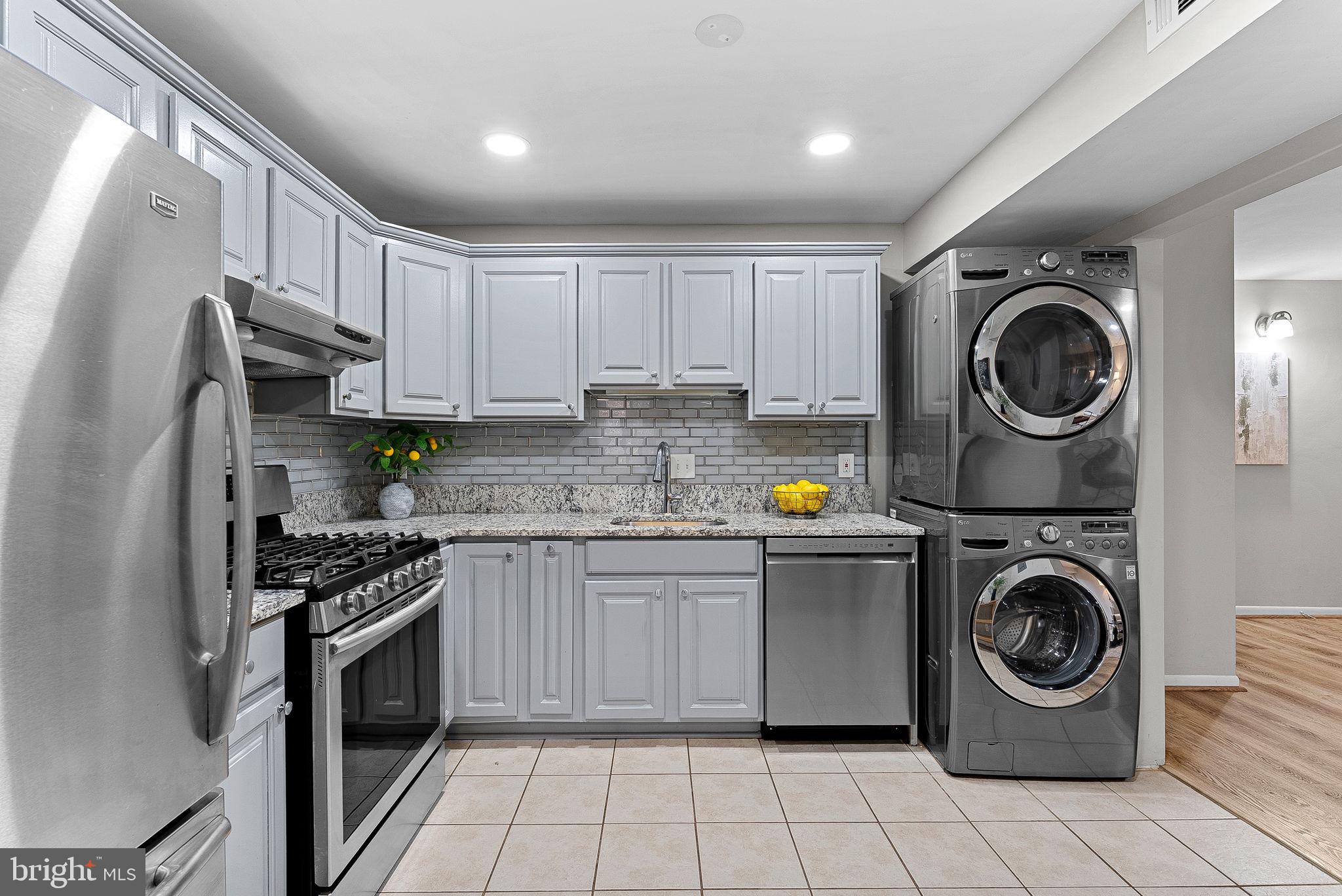 11808 Breton Court, Unit 12C Reston, VA 20191 - Photo 18 of 28 Gourmet Kitchen w/SS appliances and laundry