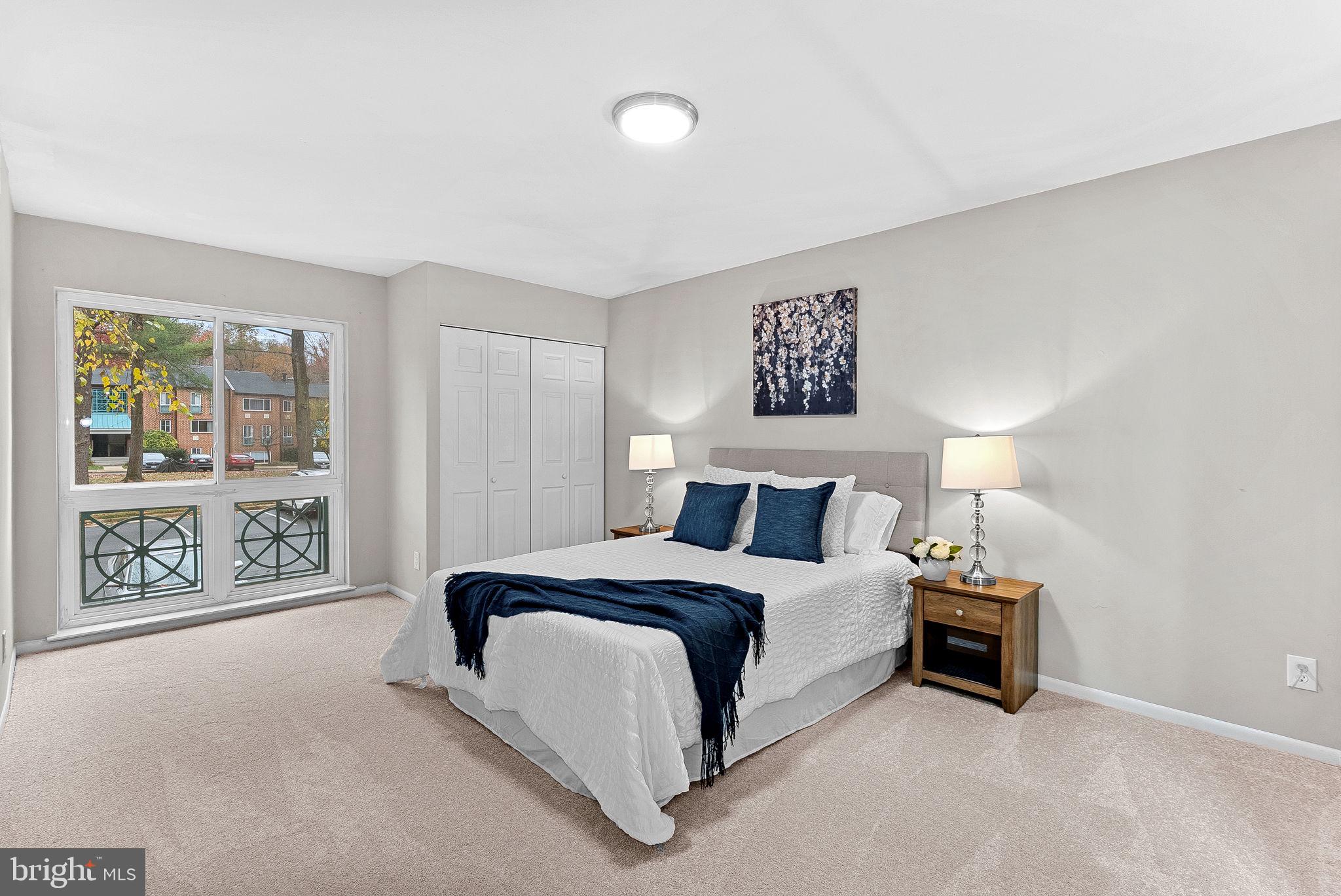 11808 Breton Court, Unit 12C Reston, VA 20191 - Photo 19 of 28 Primary Suite w/half bath and walk-in closet