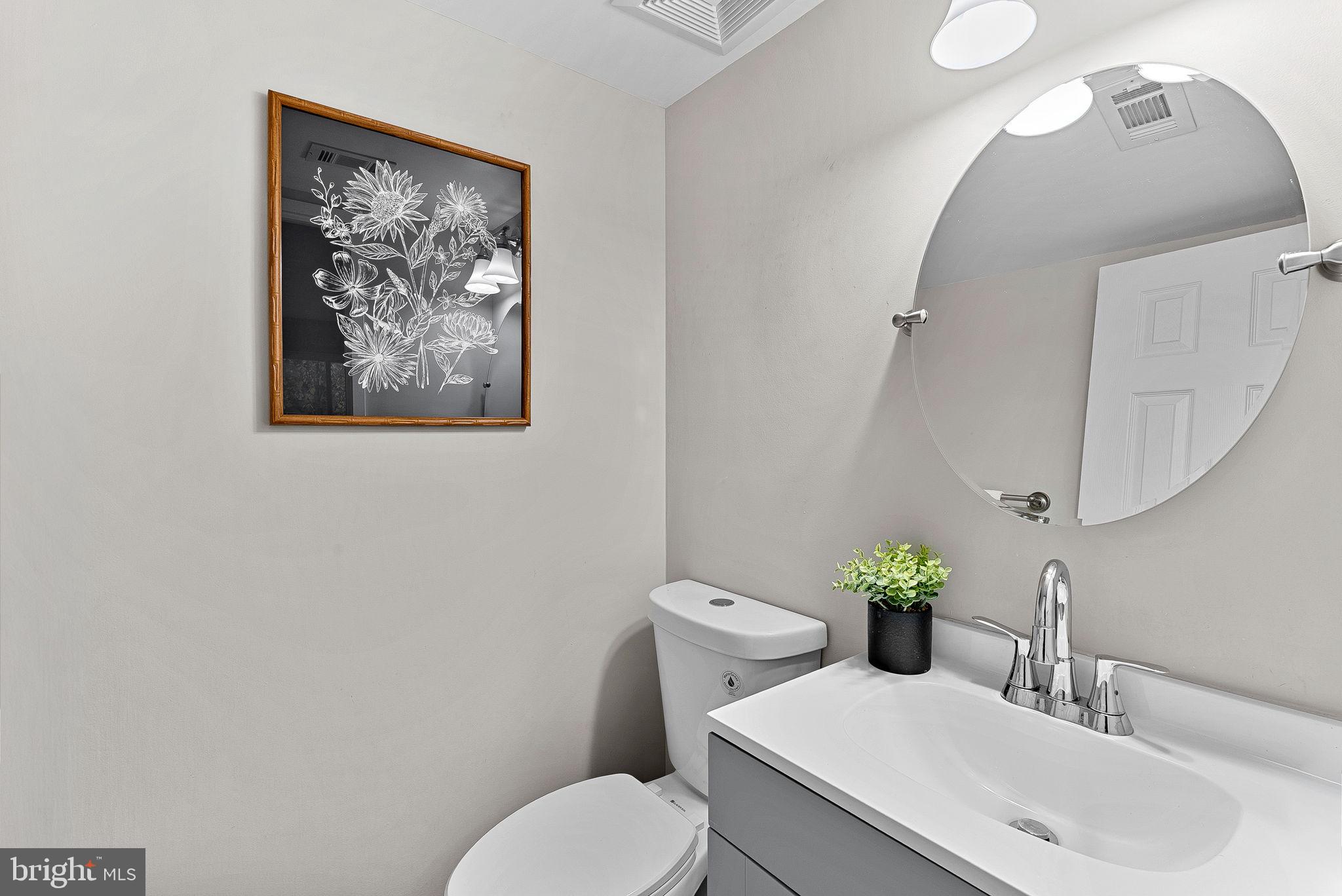 11808 Breton Court, Unit 12C Reston, VA 20191 - Photo 22 of 28 Primary suite half-bathroom