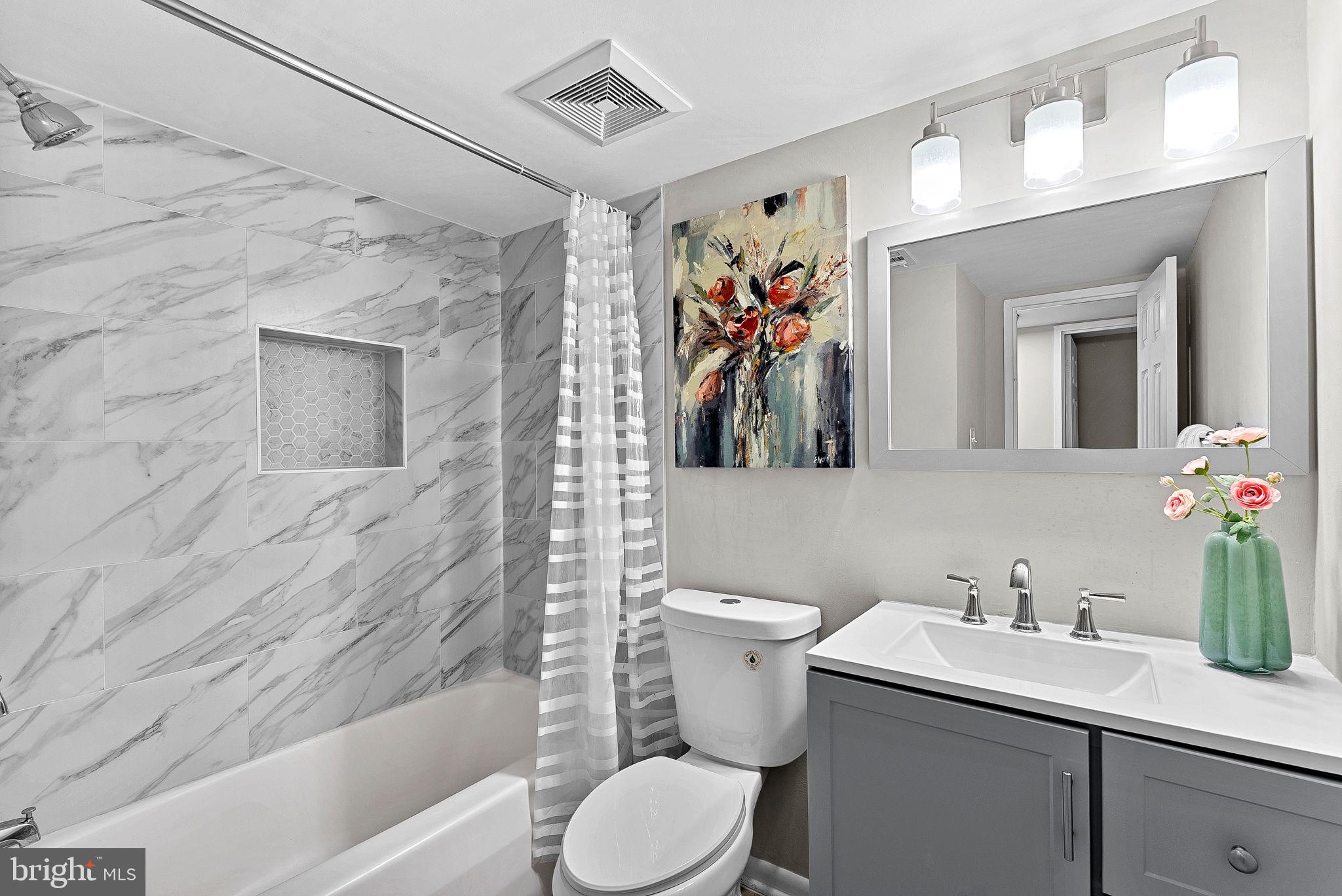 11808 Breton Court, Unit 12C Reston, VA 20191 - Photo 26 of 28 Full Hallway Bathroom