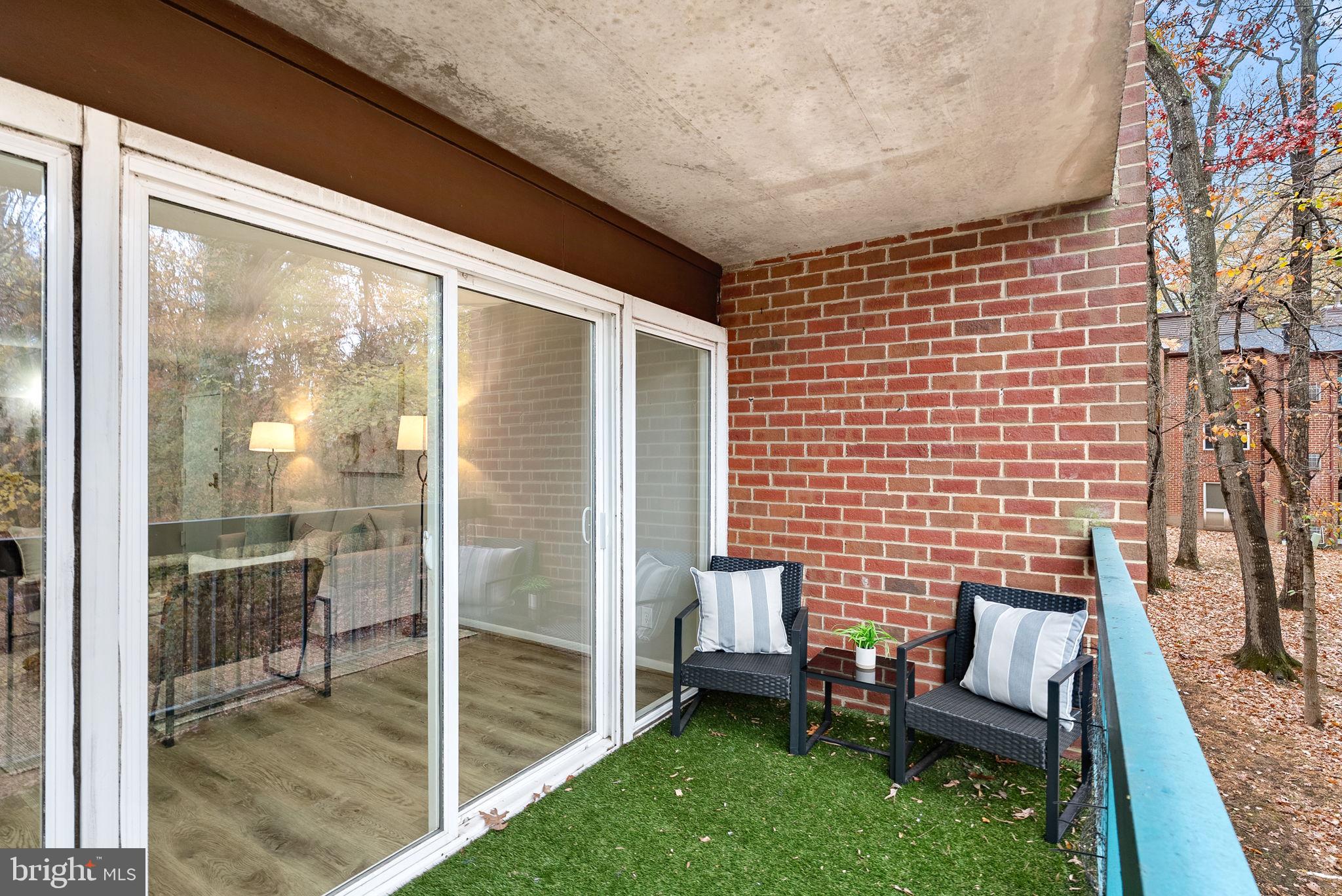 11808 Breton Court, Unit 12C Reston, VA 20191 - Photo 28 of 28 Balcony overlooking woods w/storage
