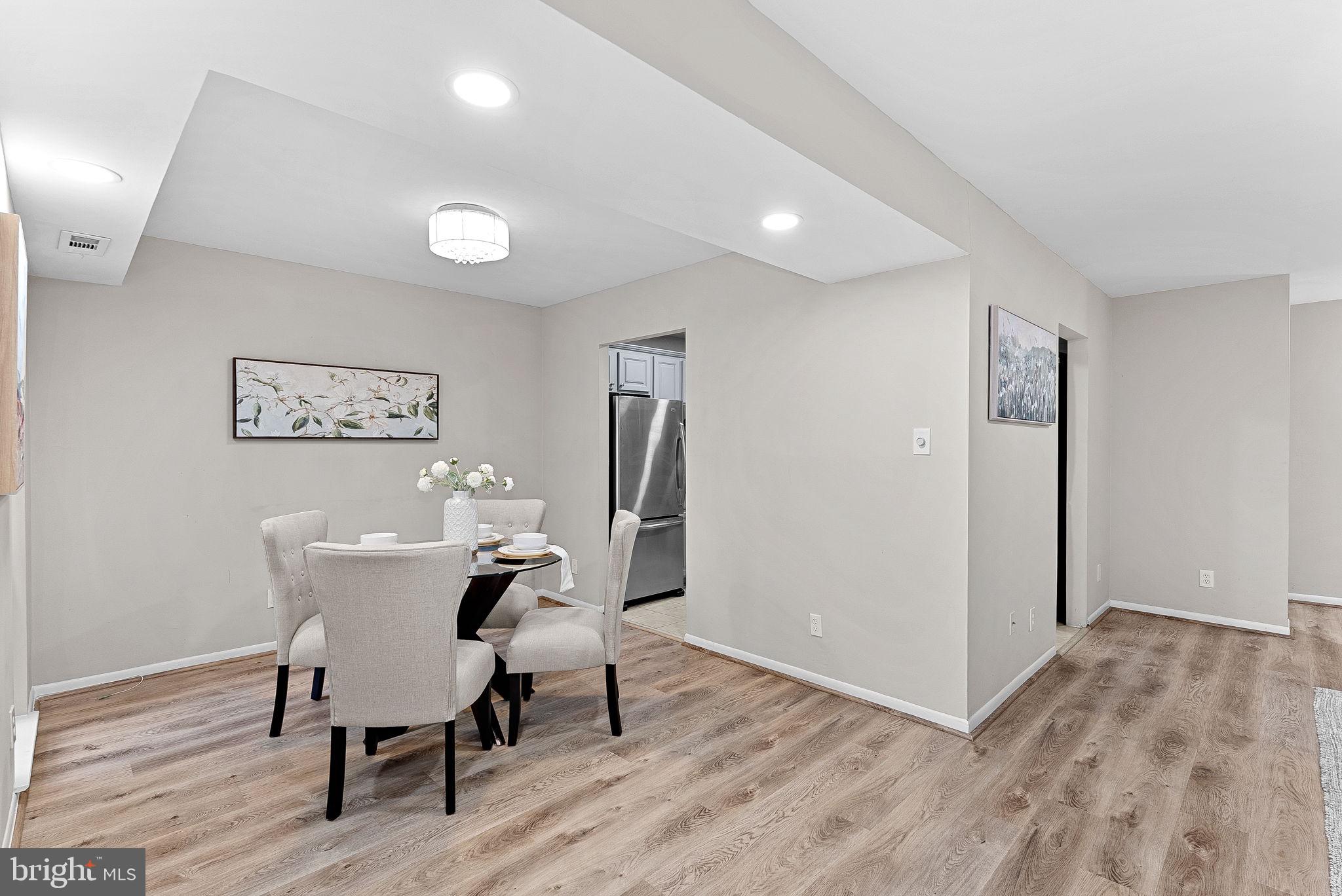 11808 Breton Court, Unit 12C Reston, VA 20191 - Photo 9 of 28 Formal Dining Room