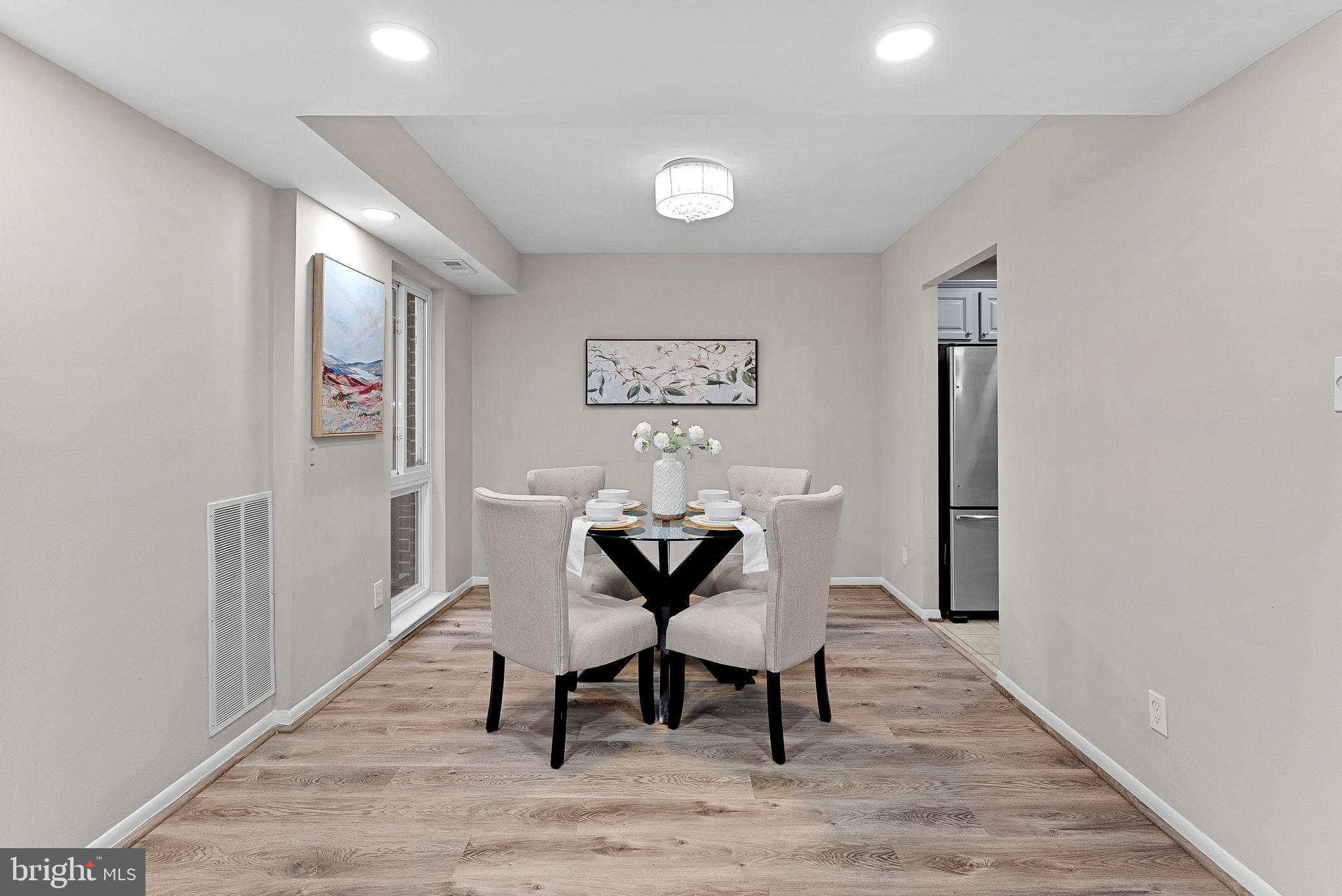 11808 Breton Court, Unit 12C Reston, VA 20191 - Photo 10 of 28 Formal Dining Room