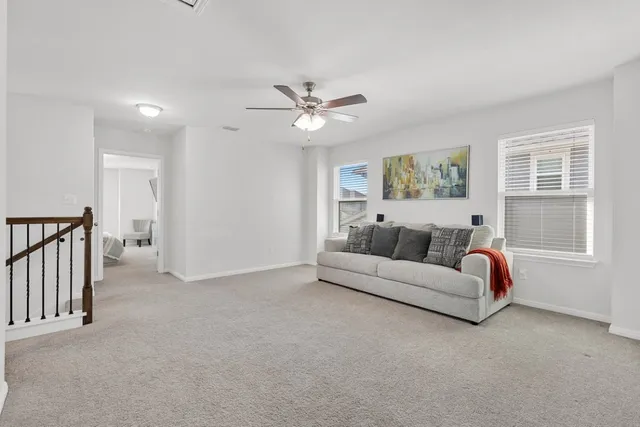 a bathroom with a double vanity sink mirror and toilet