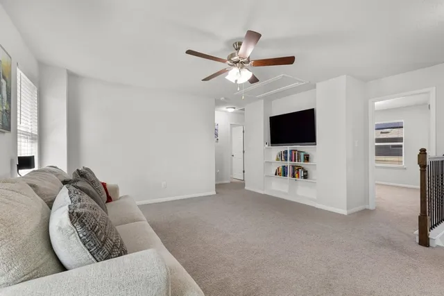 a room with furniture and window