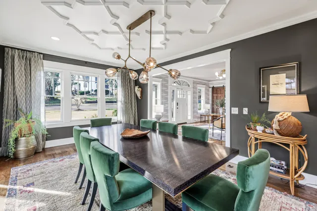 a view of a dining room with furniture window and outside view