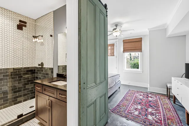 a kitchen with a sink stove and refrigerator