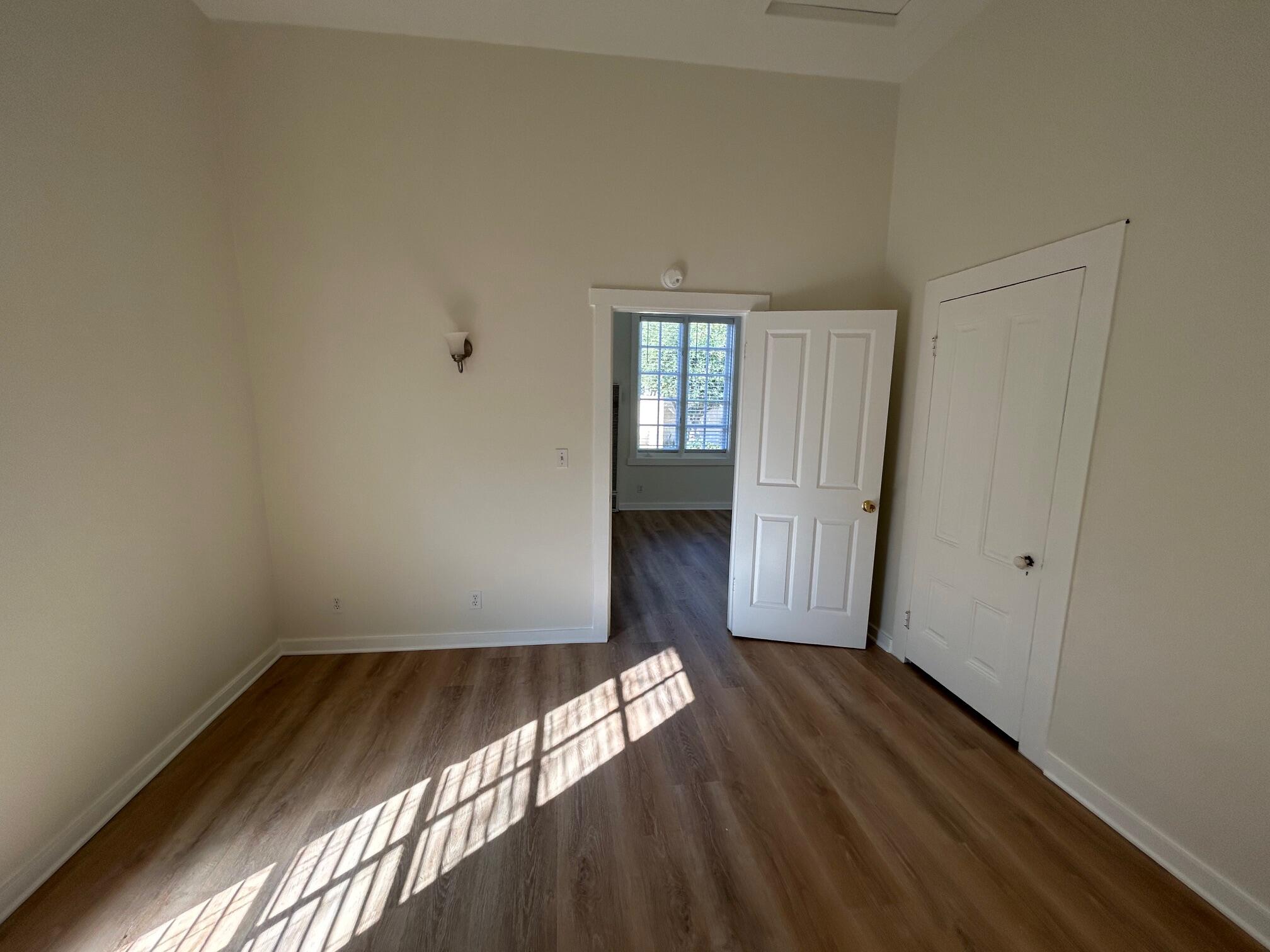 810 East Canon Perdido Street, Unit A Santa Barbara, CA 93103 - Photo 9 of 12 a view of empty room with wooden floor