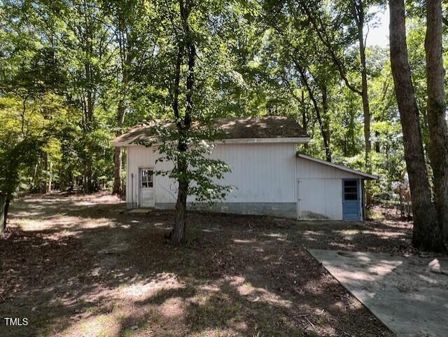 5629 Tabbs Creek Road Oxford, NC 27565 - Photo 15 of 40 a view of a house with a tree