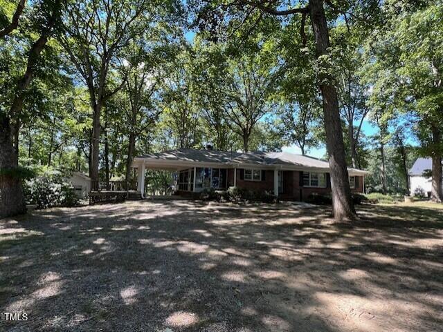 5629 Tabbs Creek Road Oxford, NC 27565 - Photo 2 of 40 a front view of a house with yard