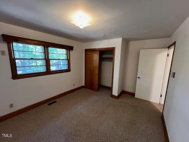 5629 Tabbs Creek Road Oxford, NC 27565 - Photo 26 of 40 an empty room with windows