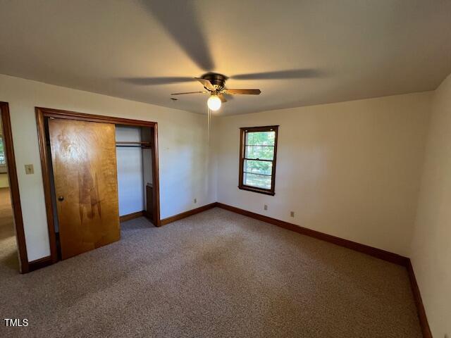 5629 Tabbs Creek Road Oxford, NC 27565 - Photo 27 of 40 an empty room with closet and a ceiling fan