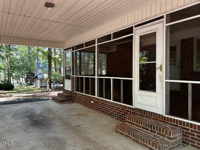 5629 Tabbs Creek Road Oxford, NC 27565 - Photo 40 of 40 a view of a balcony with door