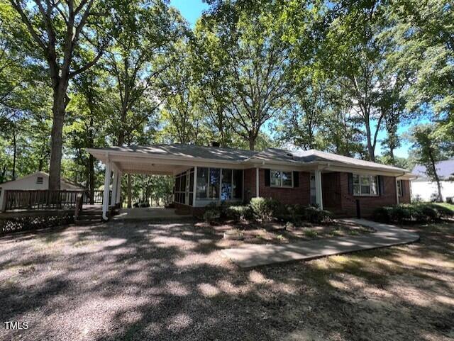 5629 Tabbs Creek Road Oxford, NC 27565 - Photo 7 of 40 a view of a house with a yard