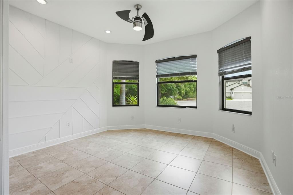 12417 Coralbean Court New Port Richey, FL 34654 - Photo 26 of 64 a view of an empty room with windows