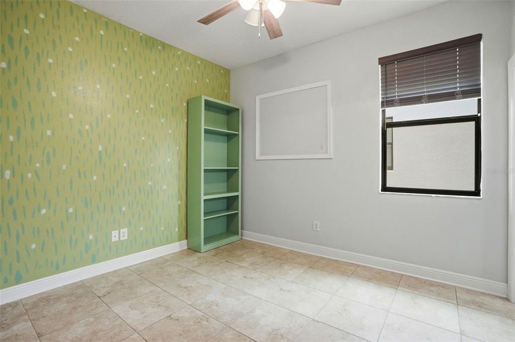 12417 Coralbean Court New Port Richey, FL 34654 - Photo 34 of 64 a view of an empty room with a bathroom