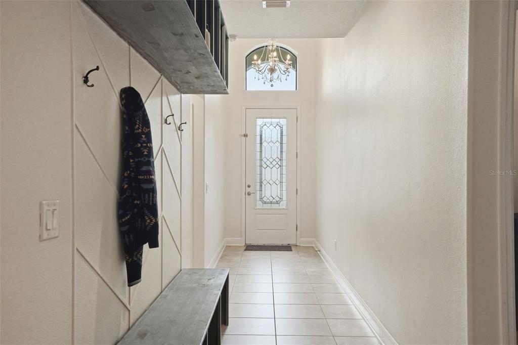 12417 Coralbean Court New Port Richey, FL 34654 - Photo 8 of 64 a view of a hallway with elevator
