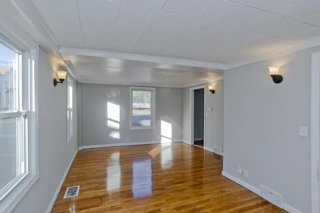 a view of livingroom with hardwood floor and window