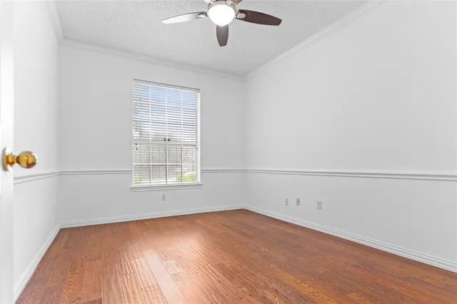 a kitchen with stainless steel appliances granite countertop a sink a stove and microwave