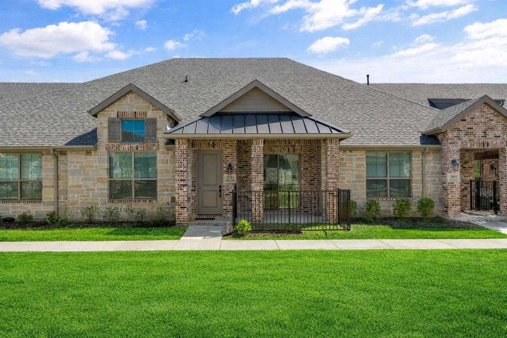 3781 Rochelle Court Prosper, TX 75078 - Photo 1 of 30 View of front of home with a front lawn, brick siding, roof with shingles, a standing seam roof, and stone siding