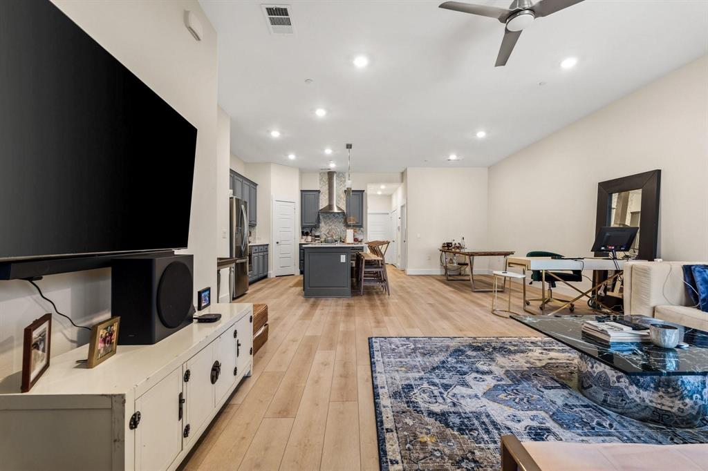 3781 Rochelle Court Prosper, TX 75078 - Photo 10 of 30 Living room with a ceiling fan, light wood-style floors, and recessed lighting