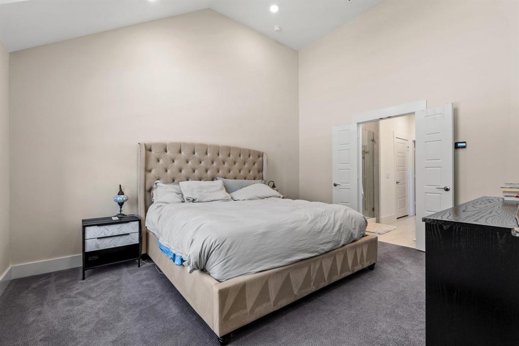 3781 Rochelle Court Prosper, TX 75078 - Photo 16 of 30 Carpeted bedroom featuring a high ceiling and baseboards