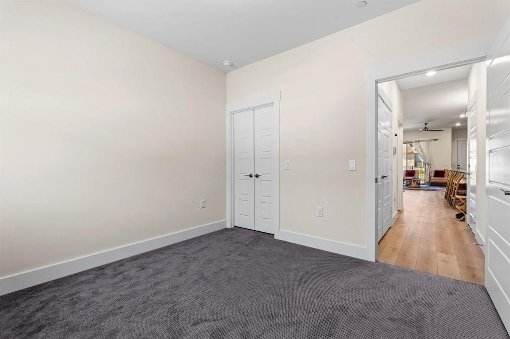 3781 Rochelle Court Prosper, TX 75078 - Photo 20 of 30 Unfurnished bedroom with light carpet and a closet