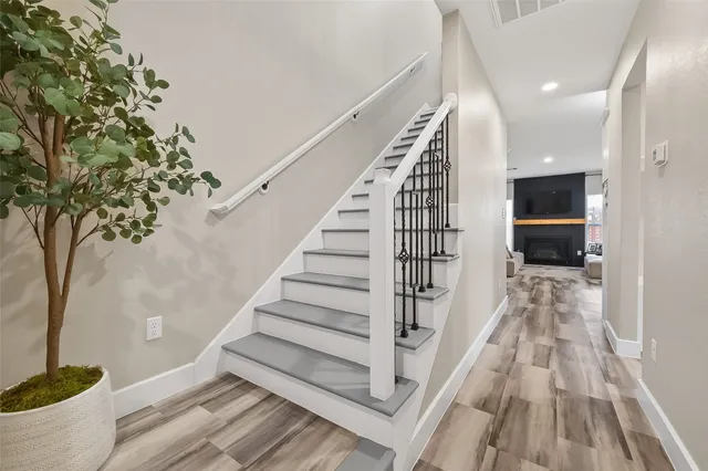 a view of entryway with wooden floor