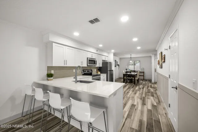 a view of a dining room with furniture