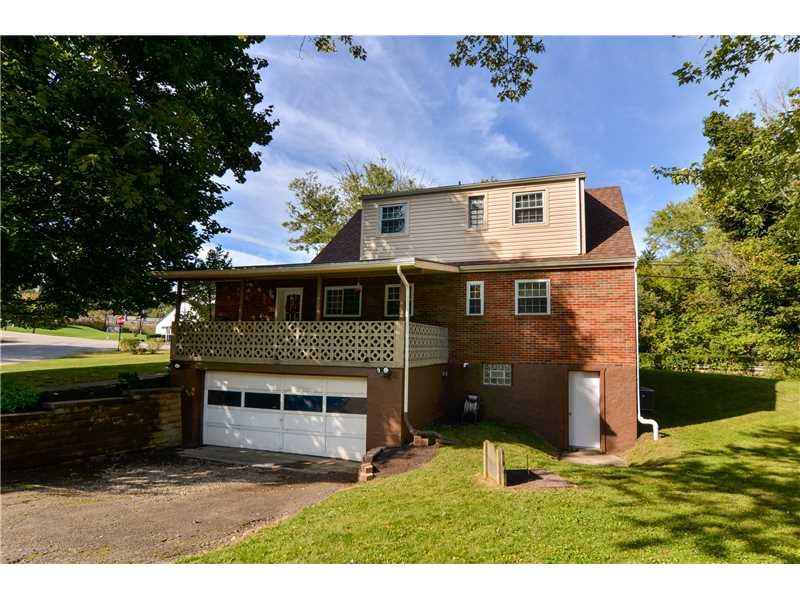 1802 Arona Road Irwin, PA 15642 - Photo 16 of 19 Exterior Back. Oversize two car garage! Plenty of room for two vehicles plus other storage needs!