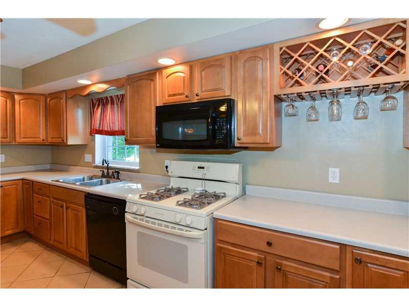 1802 Arona Road Irwin, PA 15642 - Photo 3 of 19 Kitchen. Kitchen offers an abundance of cabinets and counter space! There is even a wine rack!
