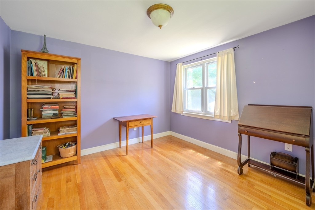 75 Ridge Street Arlington, MA 02474 - Photo 15 of 33 a view of a livingroom with furniture and a workspace