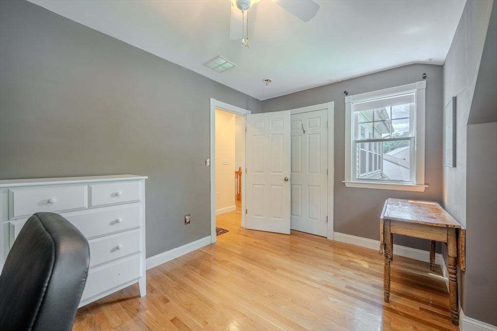 75 Ridge Street Arlington, MA 02474 - Photo 20 of 33 a bedroom with a bed and a window