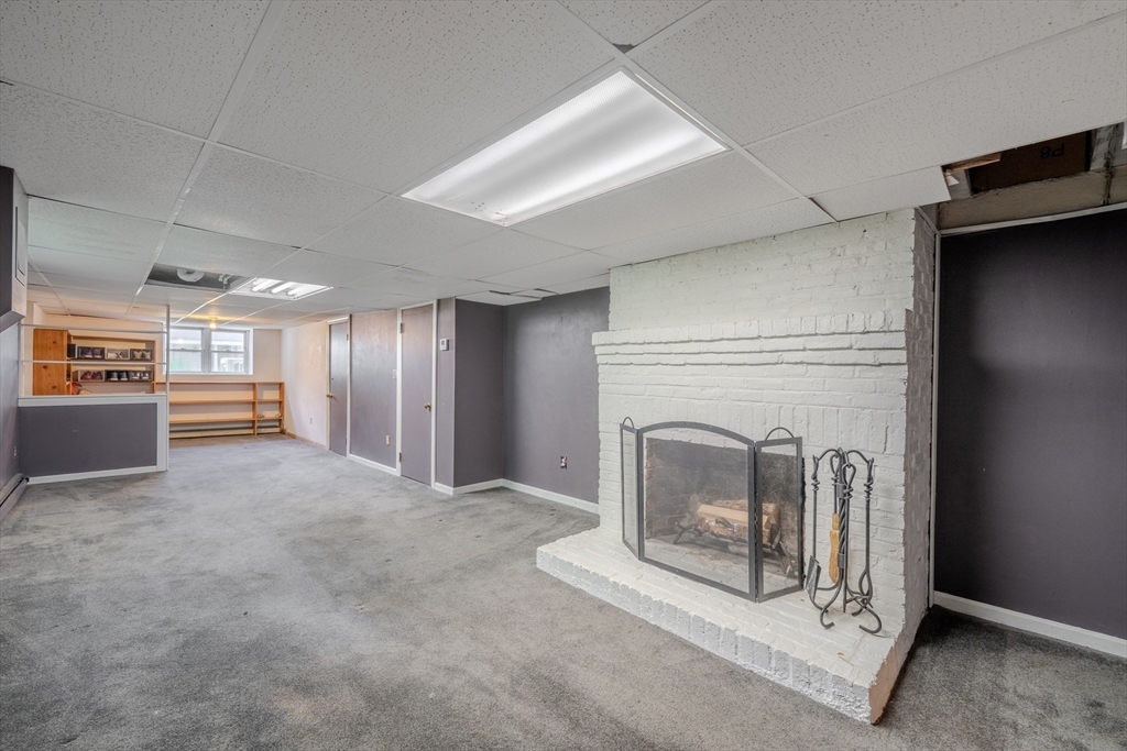 75 Ridge Street Arlington, MA 02474 - Photo 25 of 33 a view of a livingroom with a fireplace