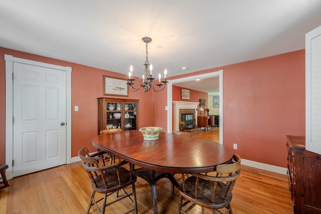 75 Ridge Street Arlington, MA 02474 - Photo 8 of 33 a dining room with furniture and chandelier
