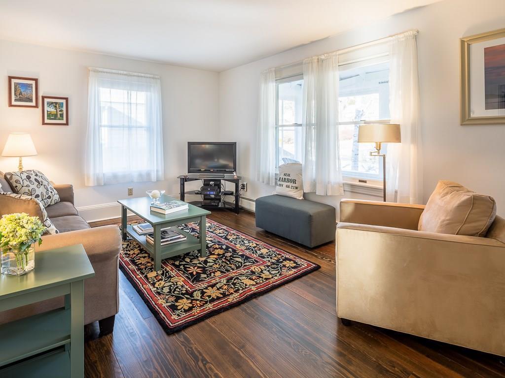 40 Jordan Pond Road Seal Harbor, ME 04675 - Photo 9 of 32 An inviting Living Room with hard...