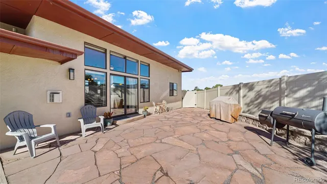 a view of a terrace with chairs