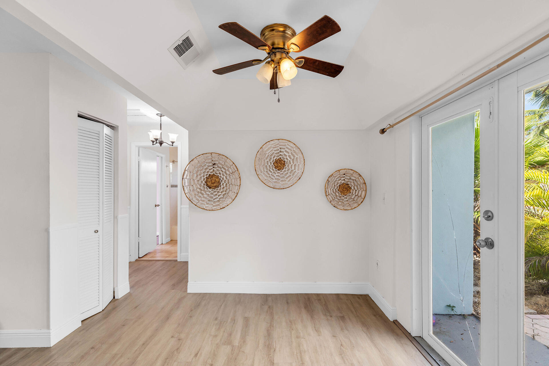 37 Orange Drive Key Largo, FL 33037 - Photo 11 of 32 a view of an empty room with wooden floor