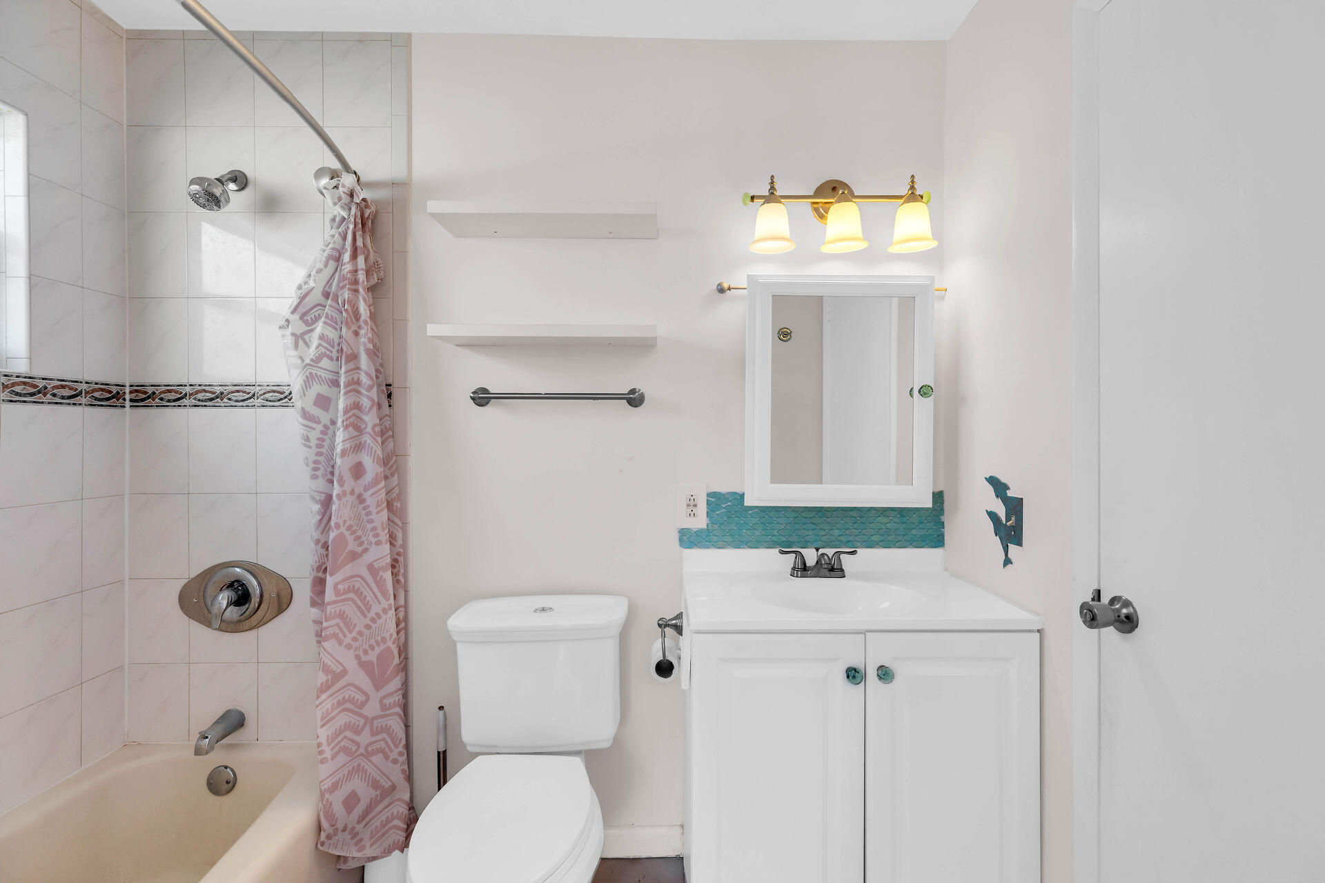 37 Orange Drive Key Largo, FL 33037 - Photo 15 of 32 a bathroom with a sink a toilet and shower