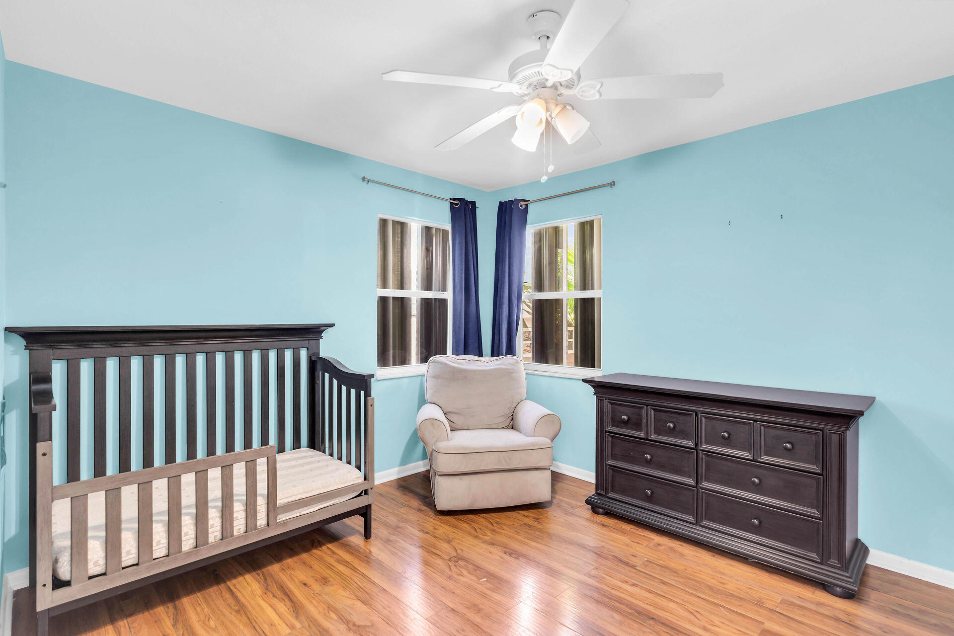 37 Orange Drive Key Largo, FL 33037 - Photo 17 of 32 a bedroom with furniture and wooden floor