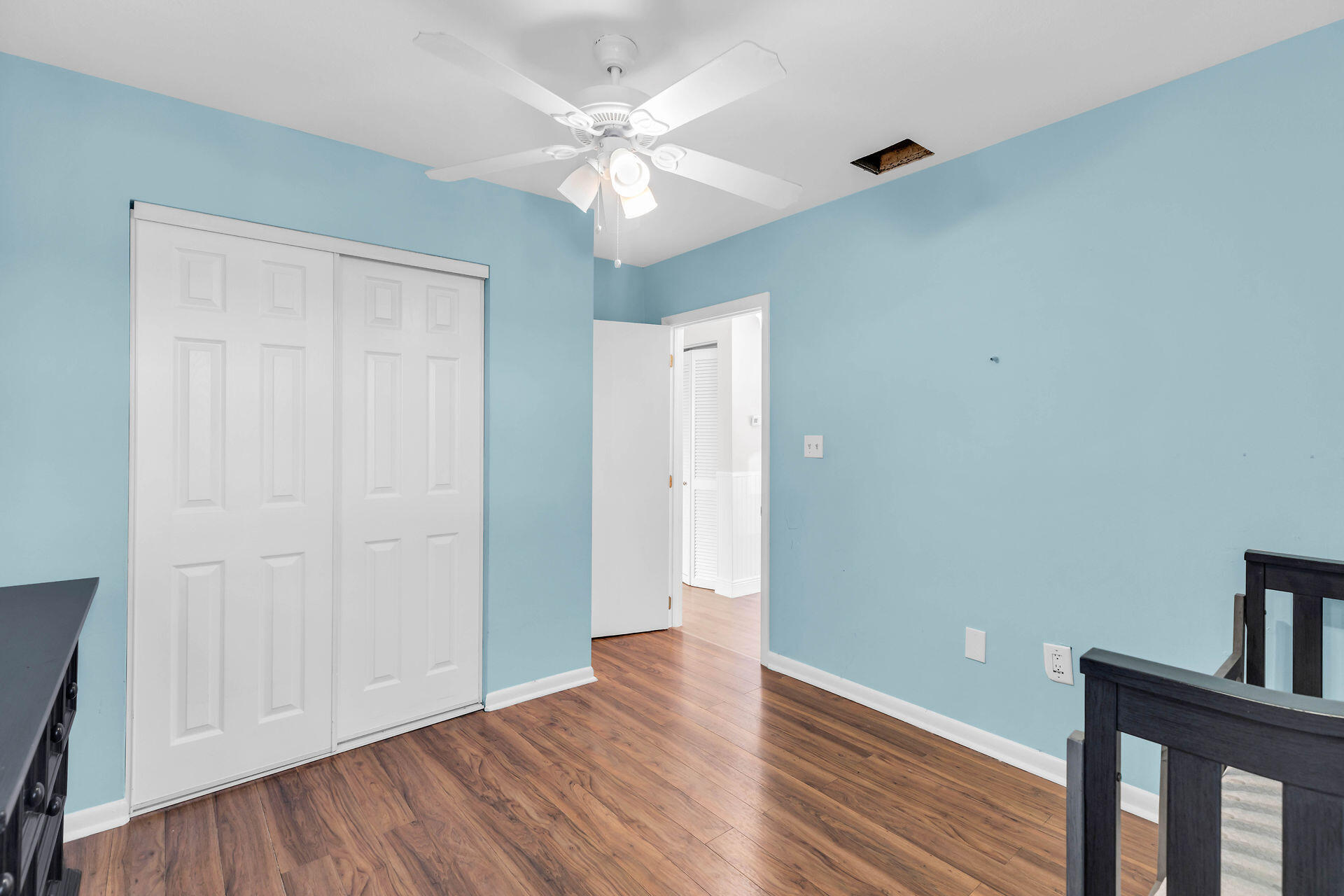 37 Orange Drive Key Largo, FL 33037 - Photo 19 of 32 wooden floor in an empty room with a window