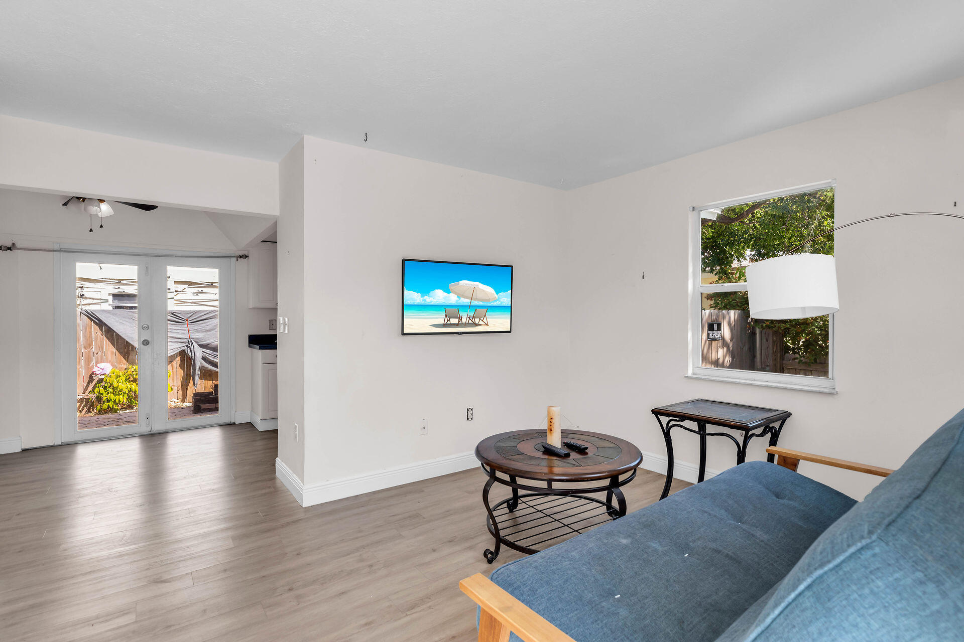 37 Orange Drive Key Largo, FL 33037 - Photo 2 of 32 a view of a livingroom with furniture and a wooden floor