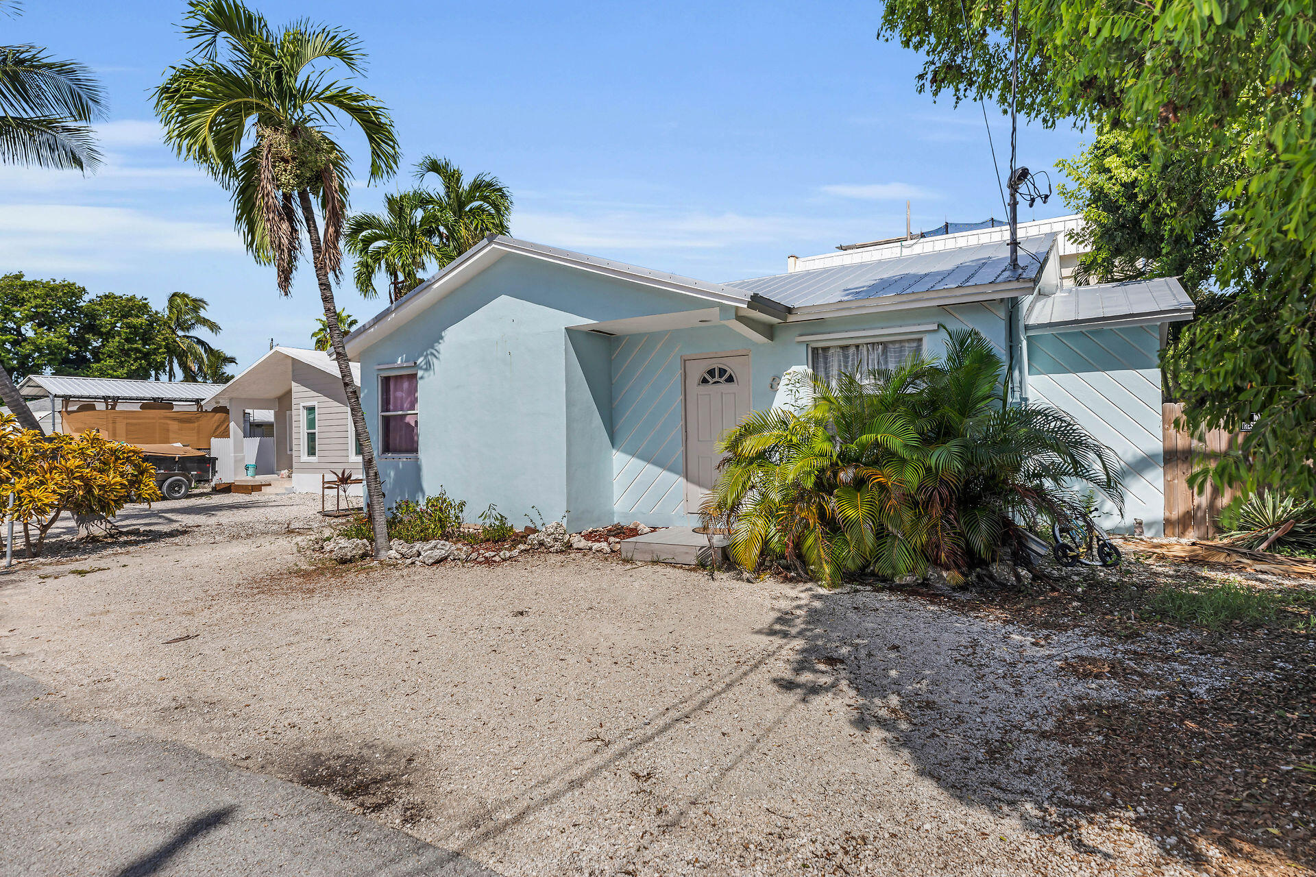 37 Orange Drive Key Largo, FL 33037 - Photo 25 of 32 a view of a house with a yard and plant