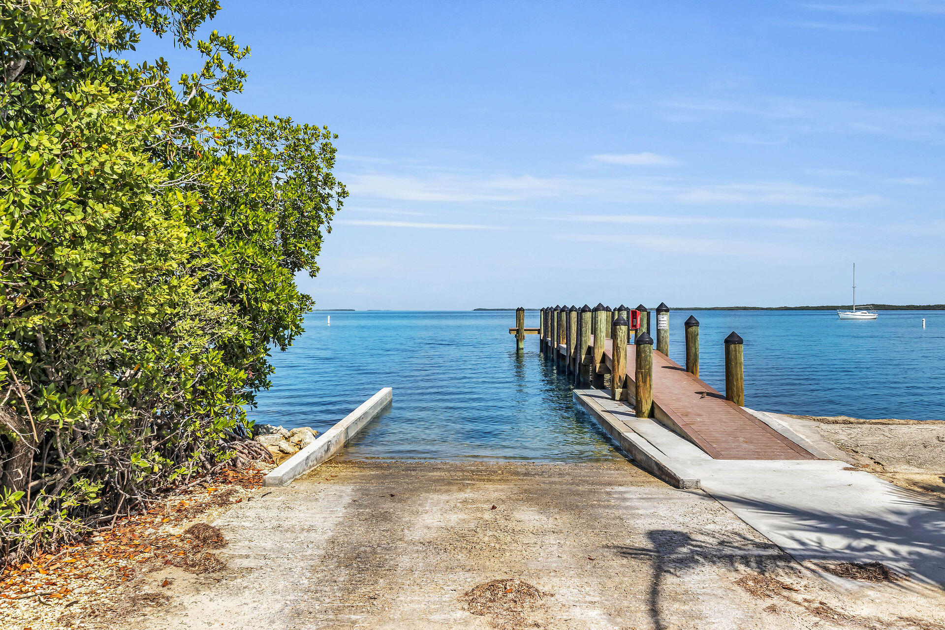 37 Orange Drive Key Largo, FL 33037 - Photo 29 of 32 a view of balcony with wooden floor and lake view