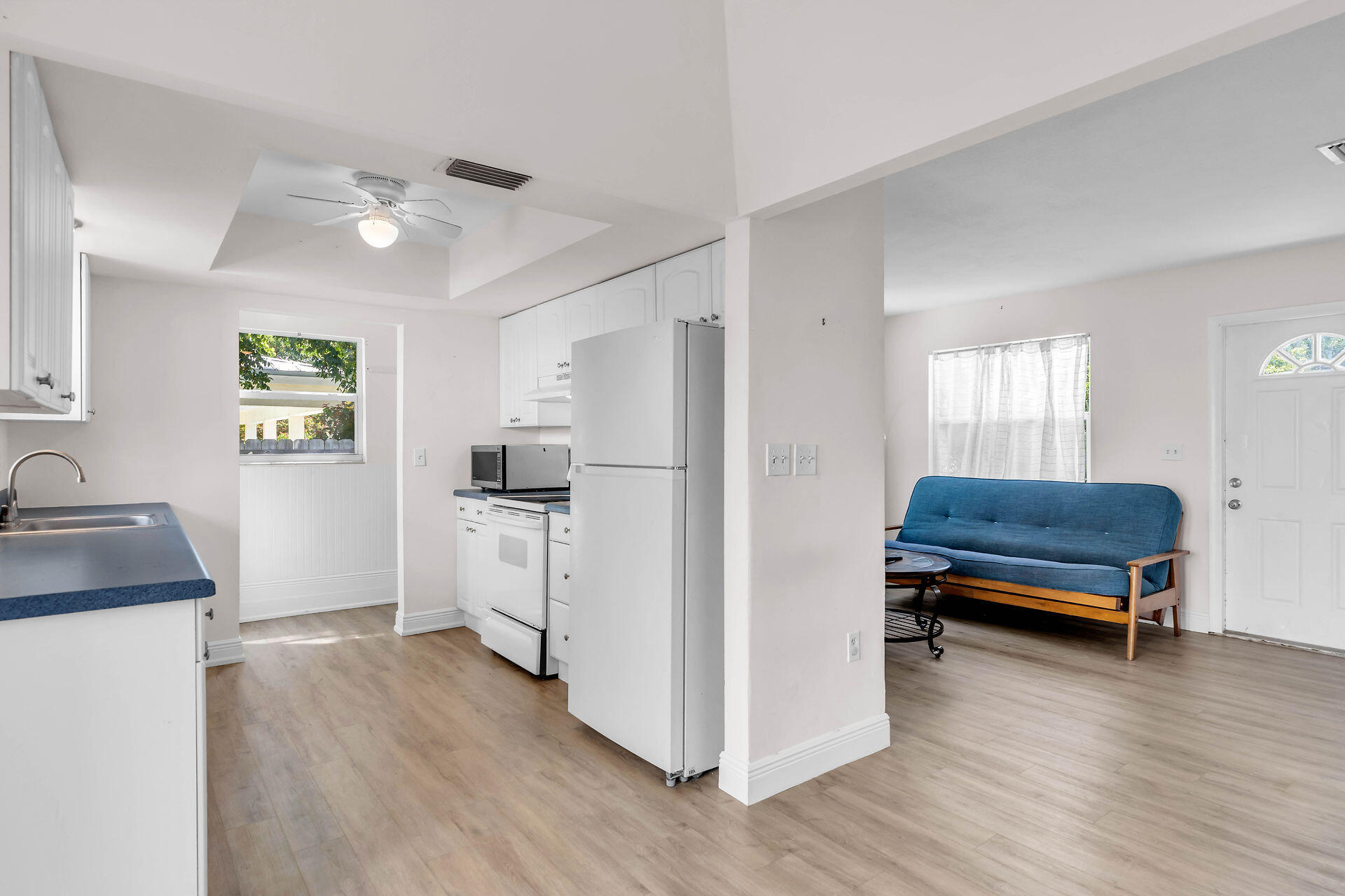 37 Orange Drive Key Largo, FL 33037 - Photo 5 of 32 a kitchen with a refrigerator and a sink