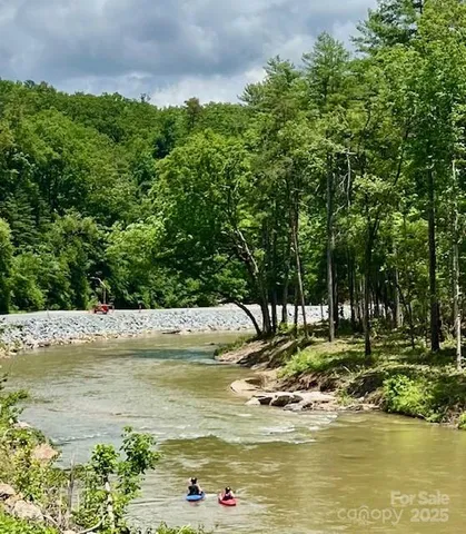 a view of a swimming pool with a garden
