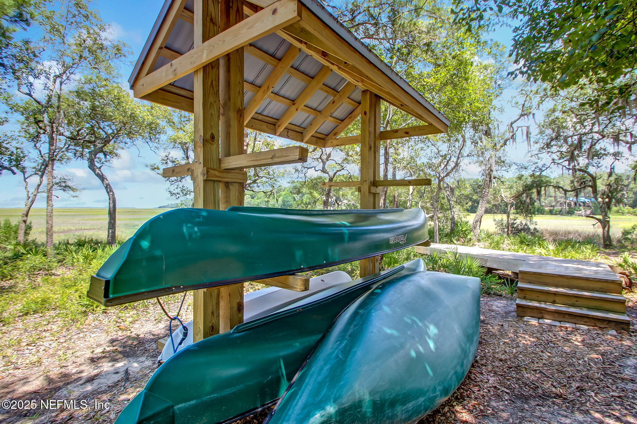 28886 Grandview Manor Yulee, FL 32097 - Photo 24 of 35 a view of a backyard with sitting area